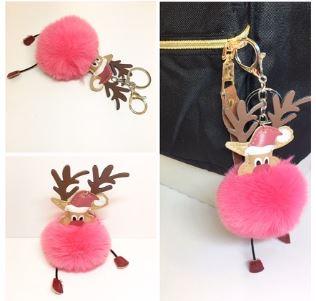 POMPON ROSA RENTIER MIT SCHLÜSSELANHÄNGER